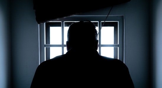 silhouette-of-a-man-in-window-143580 (1)